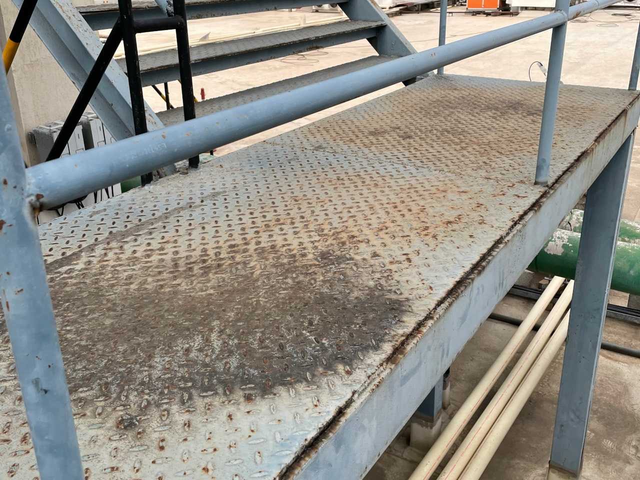 Rusty metal floor before repainting and anti-corrosion protection